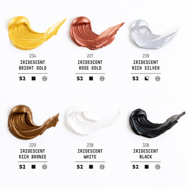 Liquitex Heavy Body - Coffret Iridescents. Palette de couleurs de 6 couleurs dans la boîte avec leur nom, numéro, code pigment et symboles d'opacité et de résistance à la lumière